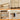 Wooden furniture with gold handles, wave panel design, smooth slide mechanism, and anti-tipping feature.