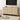 Wooden cabinet with decorative items in a living room setting