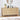 Wooden dresser with decorative items in a room setting