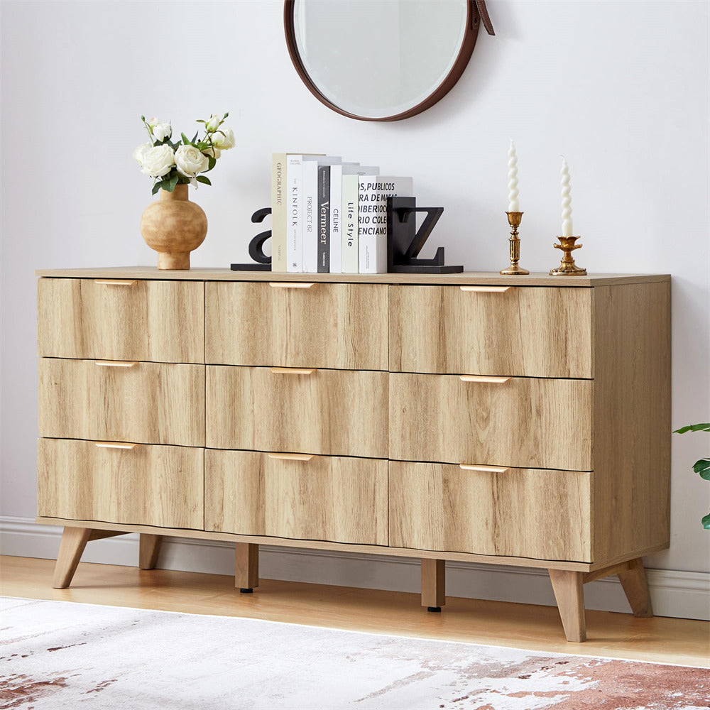 Wooden dresser with decorative items in a room setting