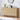 Wooden dresser with decorative items in a room setting
