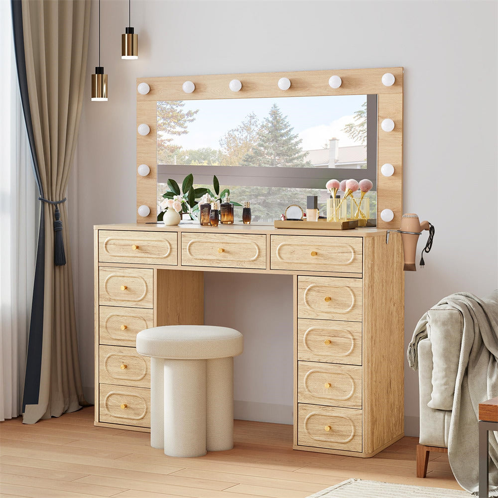 Wooden vanity with mirror and lights in a room setting