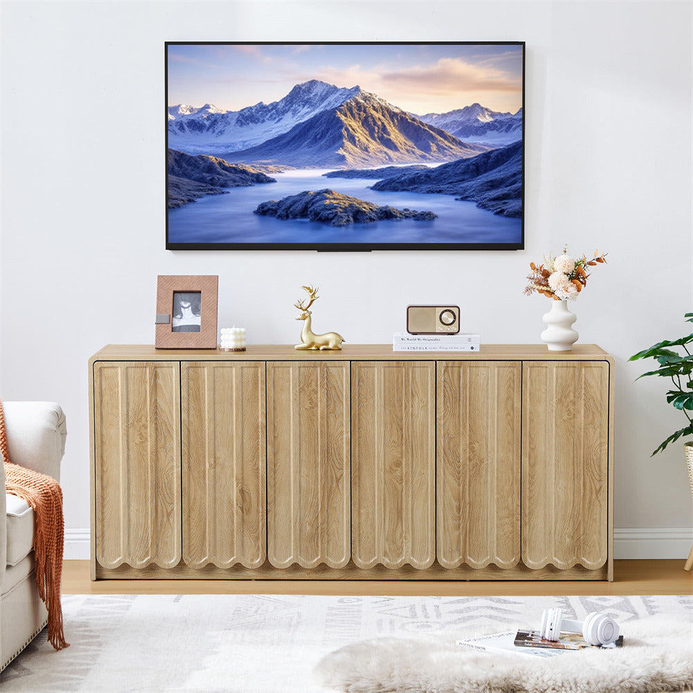 Wooden console table with decorative items in a living room setting
