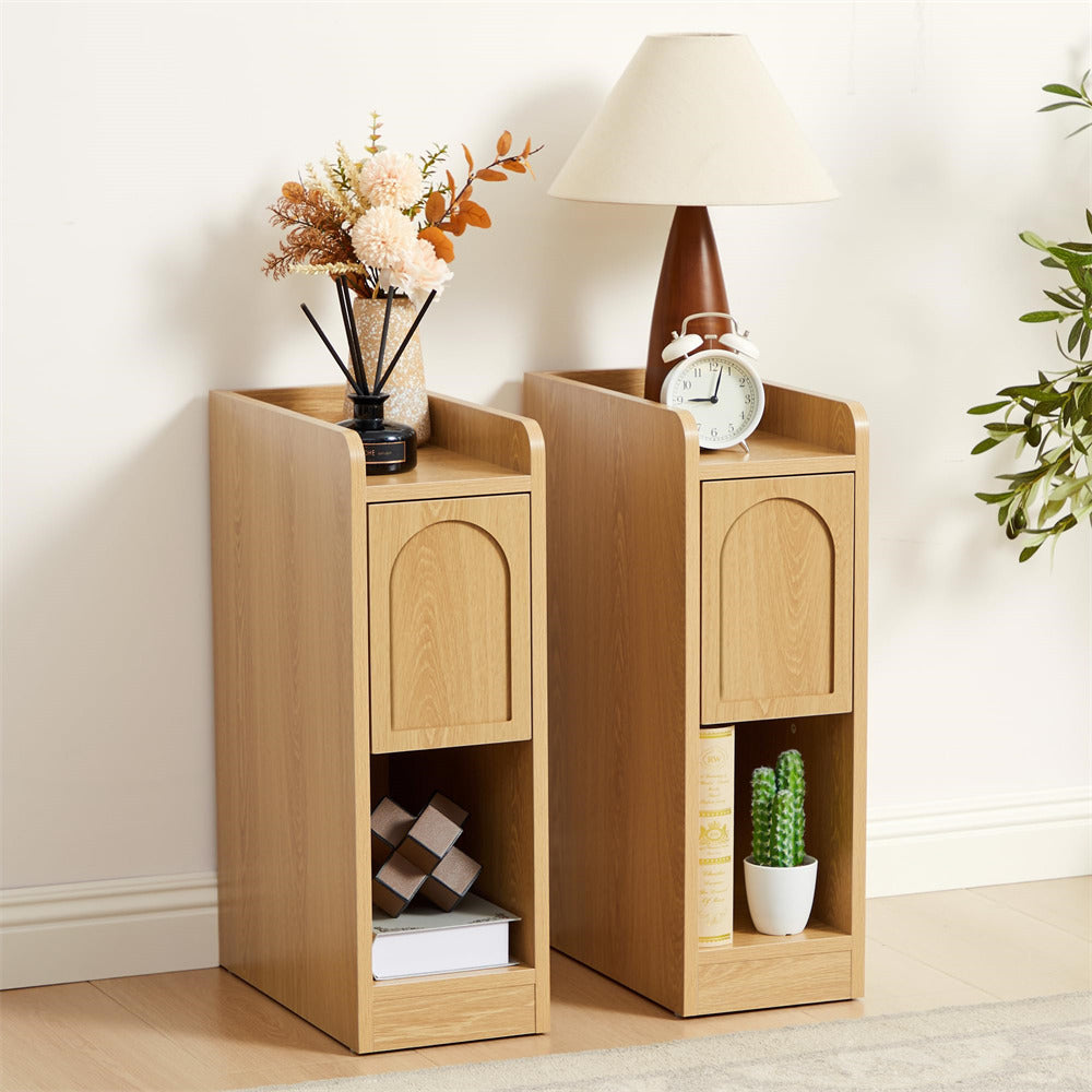 Two wooden side tables with decorative items in a room setting.