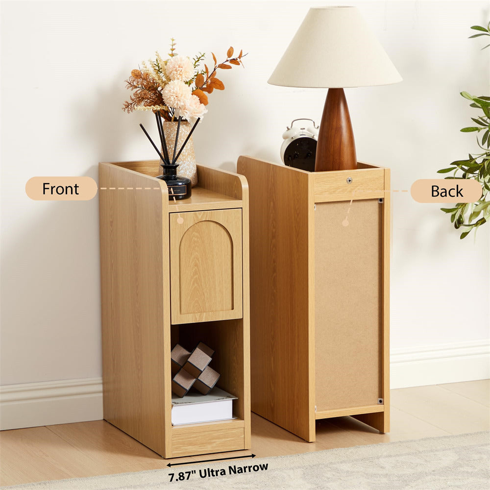 Wooden side table with front and back views, decorated with a lamp and flowers.