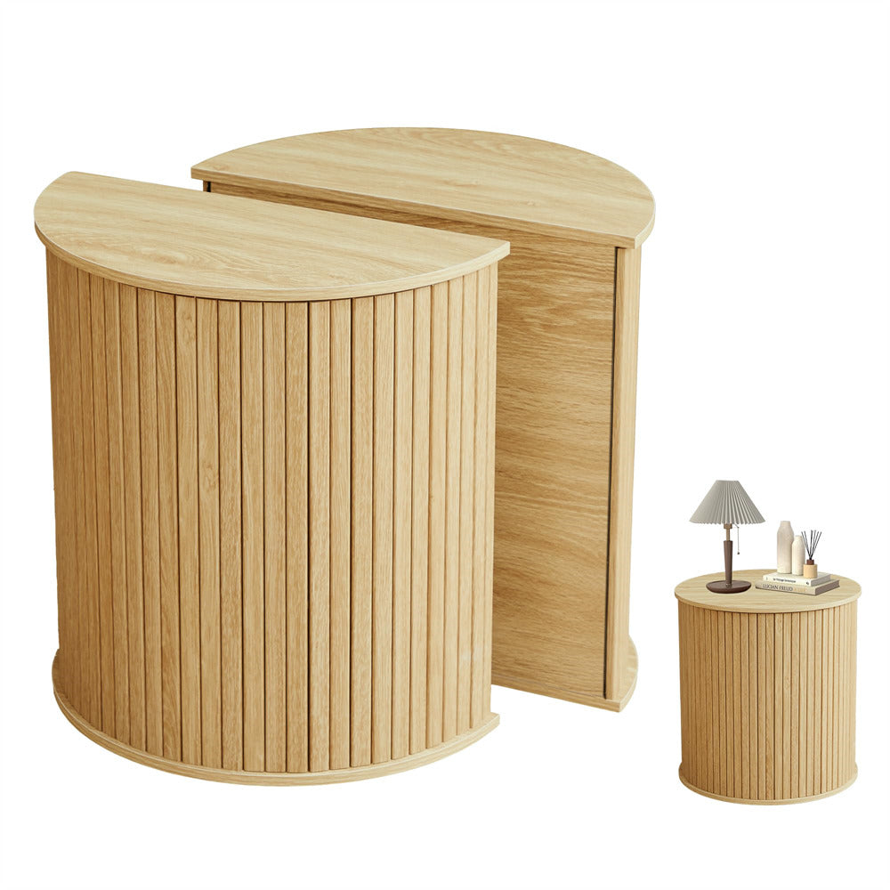 Set of wooden side tables with a smaller table displaying items on a white background