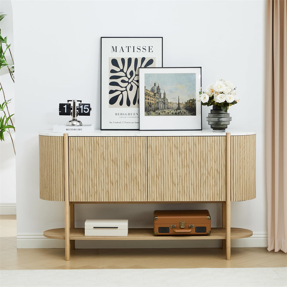 Wooden sideboard with decorative items against a white wall