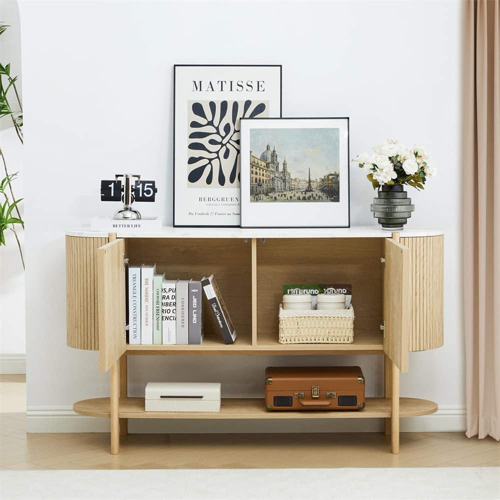 Wooden shelf with books, a suitcase, and decorative items against a white wall.