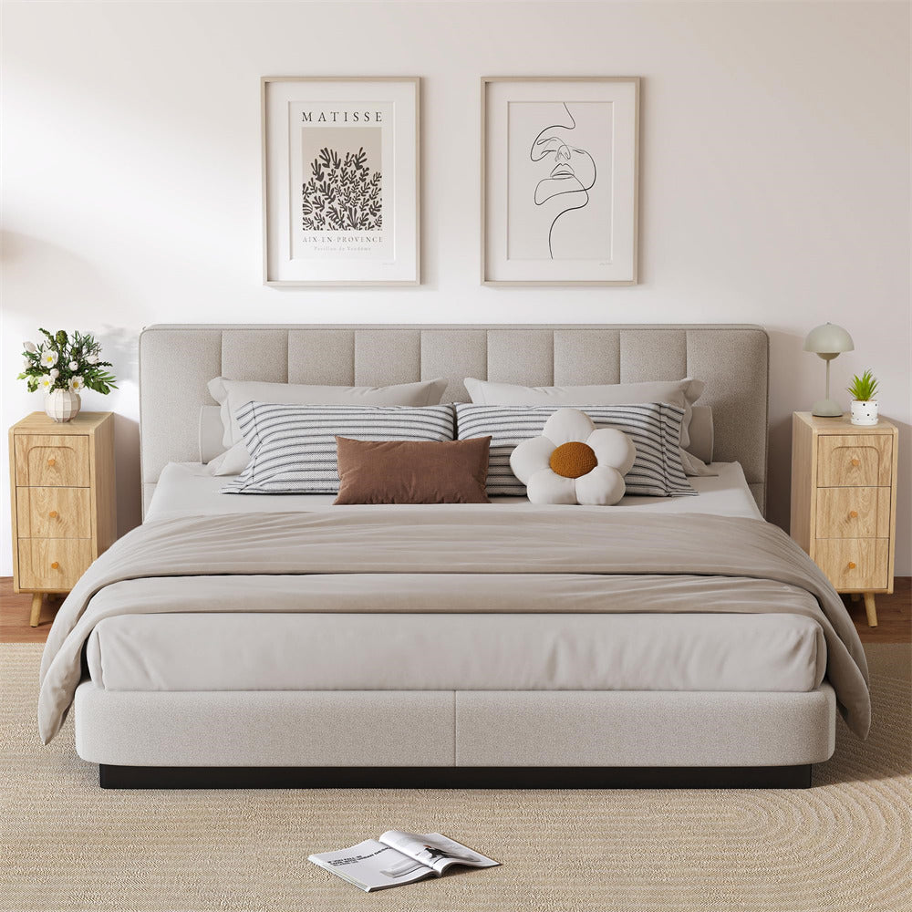 Neatly made bed with pillows and a blanket in a bedroom setting.