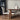 Dining area with a wooden table and chairs in a modern interior setting.