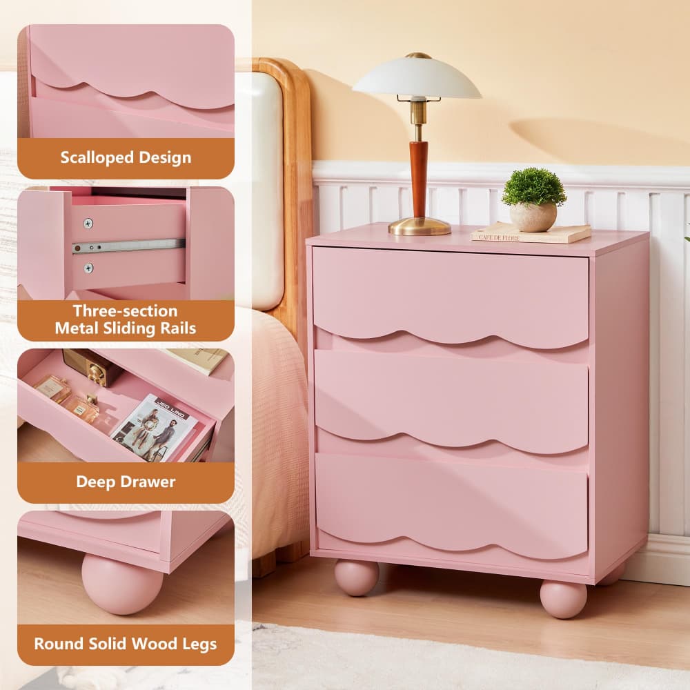 Pink three-drawer nightstand with scalloped drawer fronts and round wooden legs, shown beside a bed in a bedroom. The left side includes feature callout panels labeled 'Scalloped Design,' 'Three-section Metal Sliding Rails,' 'Deep Drawer,' and 'Round Solid Wood Legs.