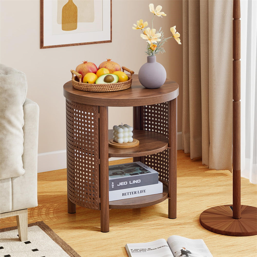 Wooden side table with books, a vase, and fruit in a living room setting.