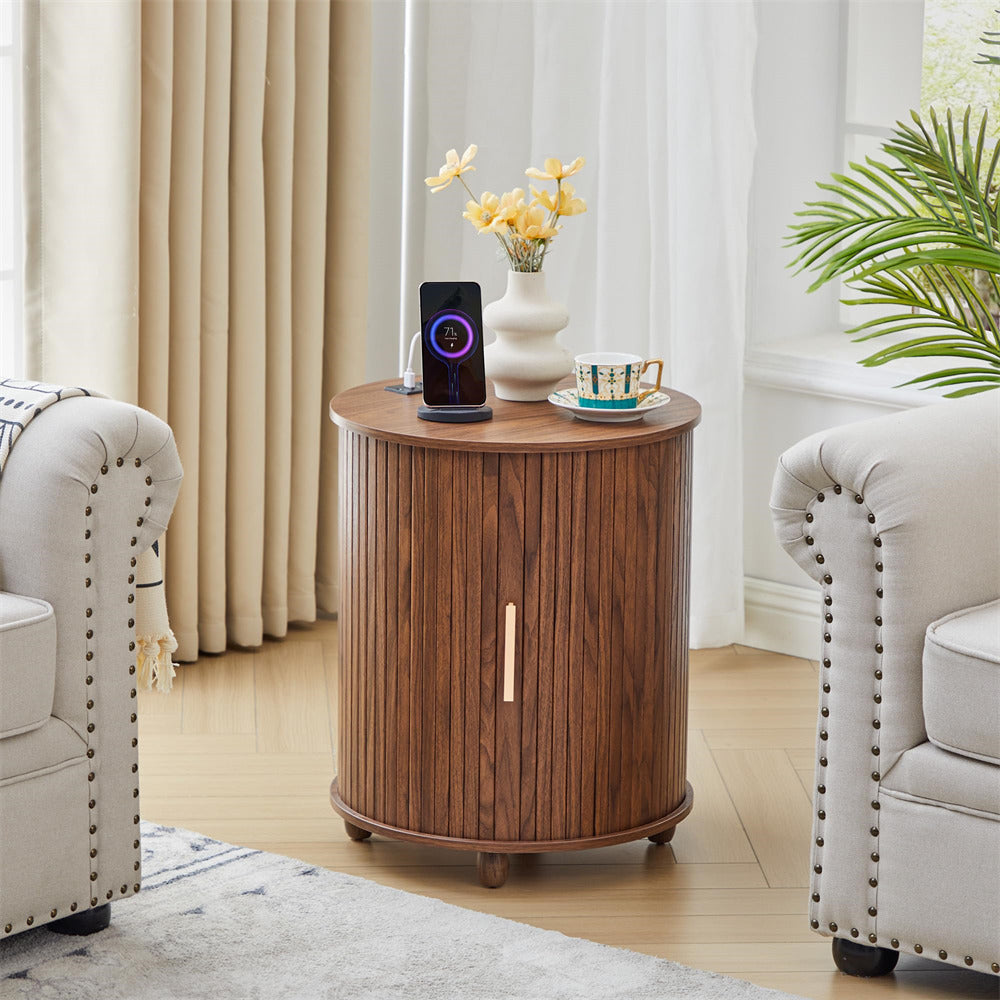 Wooden side table with a smartphone, mug, and vase in a living room setting.