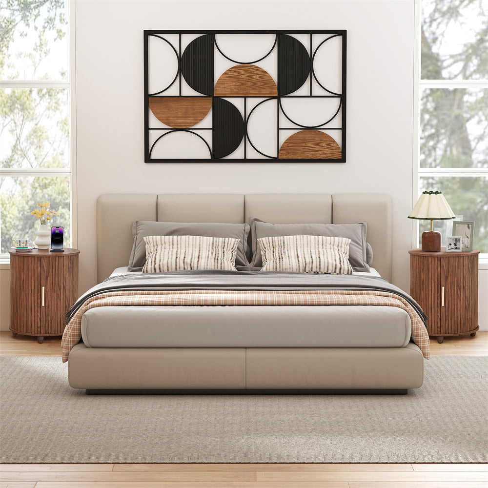 Modern bedroom with a bed, nightstands, and wall art