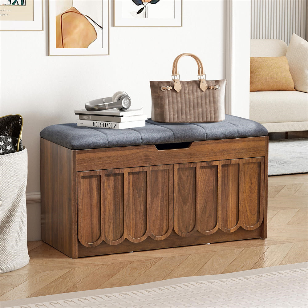 Wooden shoe storage bench with a cushion in a living room setting