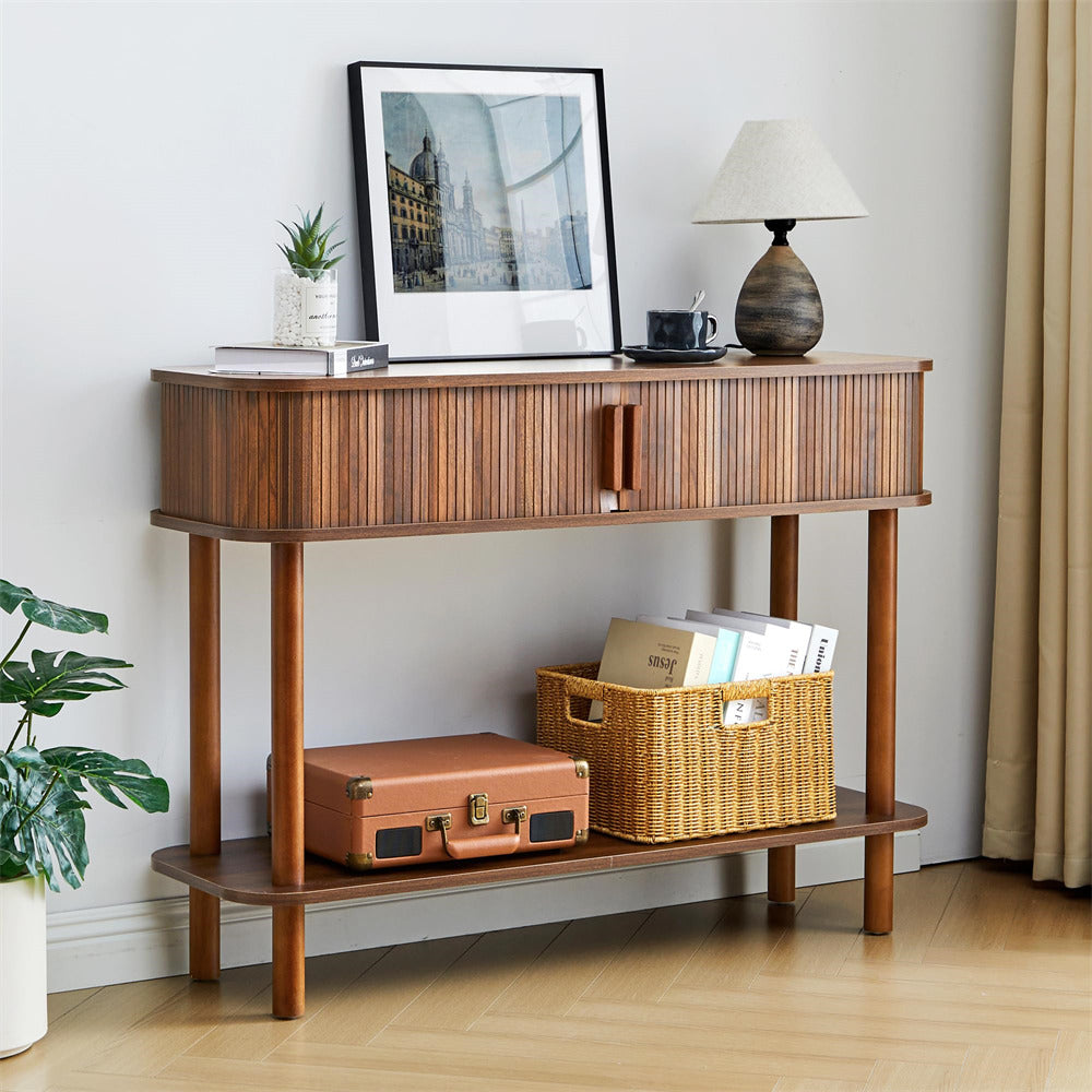 Wooden console table with decor items in a room setting