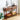 Wooden console table with decor items in a room setting