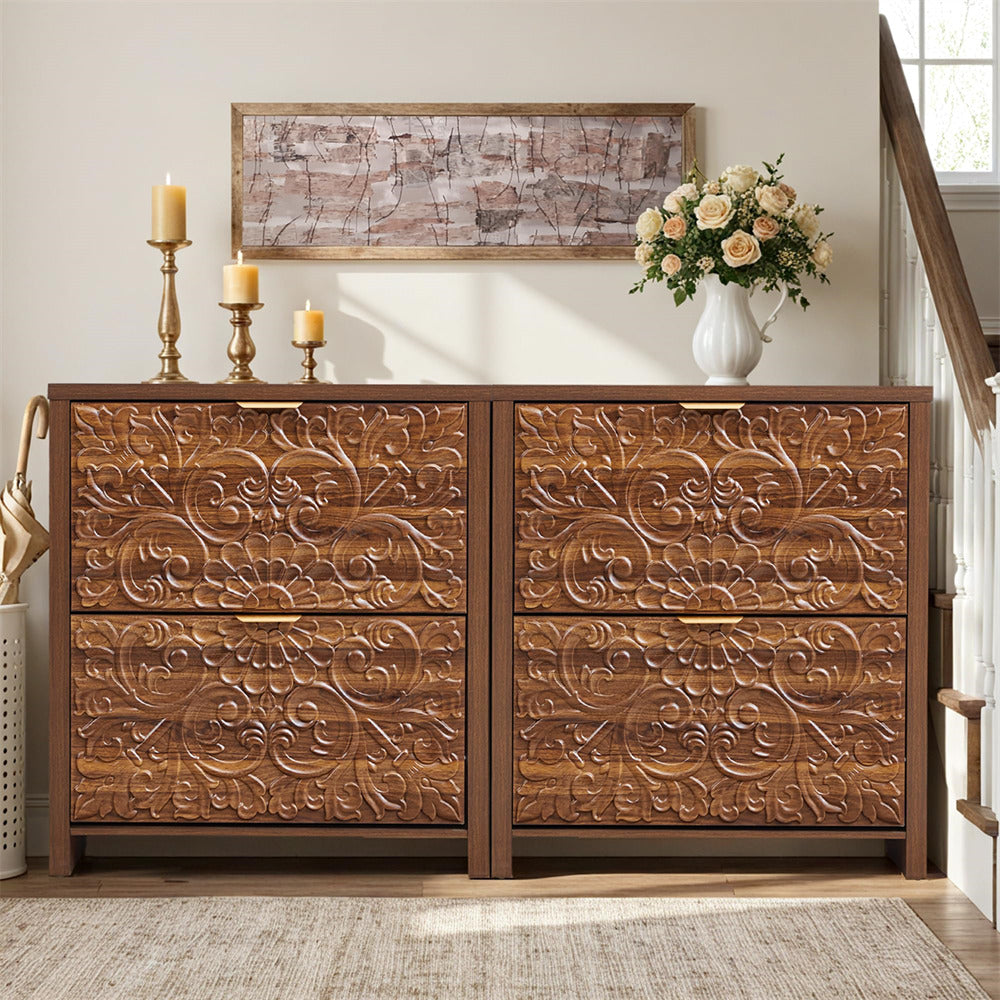 Wooden Shoe Cabinet with intricate carvings in a room with a vase of flowers and candles.
