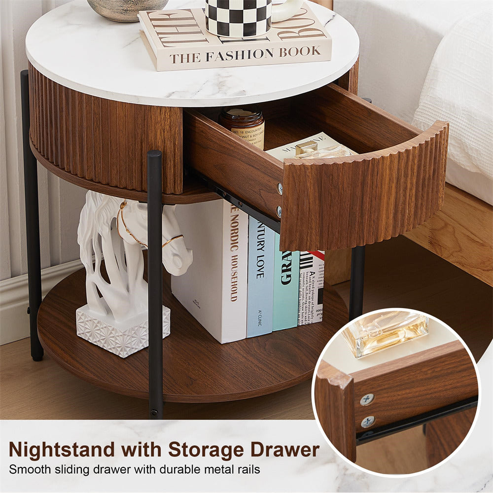 Wooden nightstand with a marble top and open drawer, featuring books and decorative items.