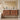 Bathroom vanity with wooden cabinets, white countertop, and decorative items.