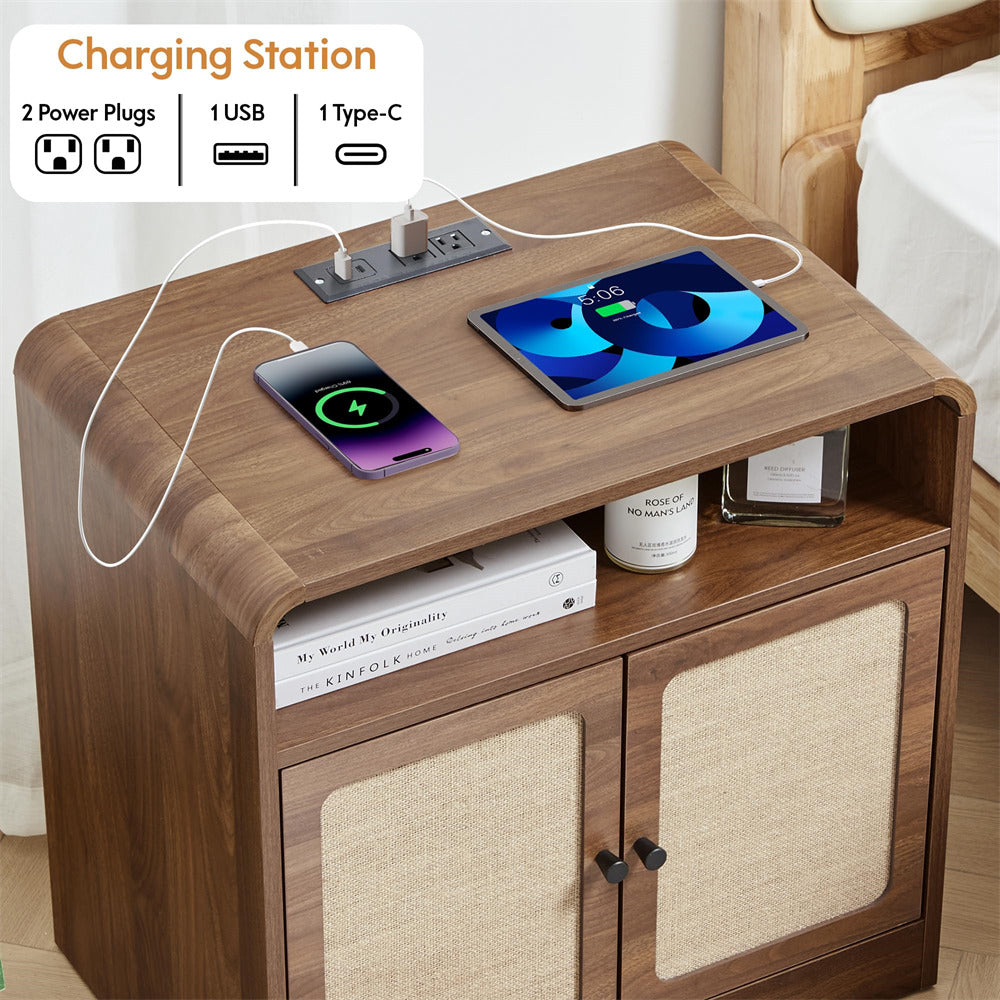 Wooden charging station with electronic devices and power outlets on a wooden table.