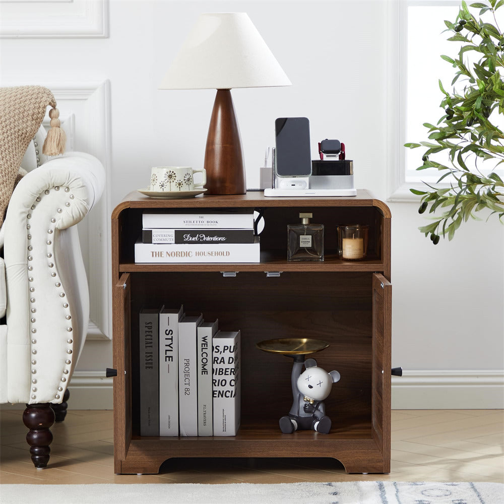 Wooden side table with books, a lamp, and decorative items in a room setting.