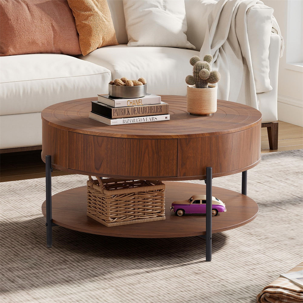 Round wooden coffee table with books, a basket, and a toy car in a living room setting.