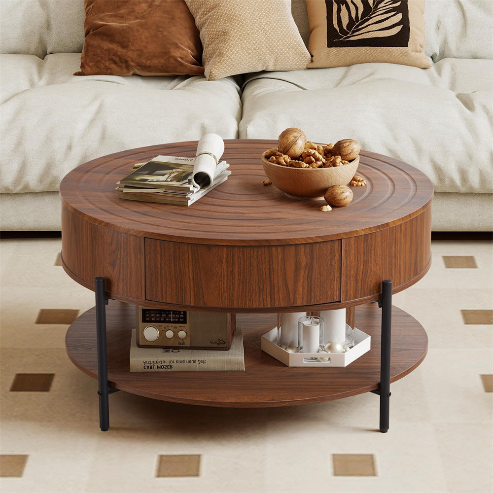 Wooden coffee table with a bowl of nuts and magazines in a living room setting.