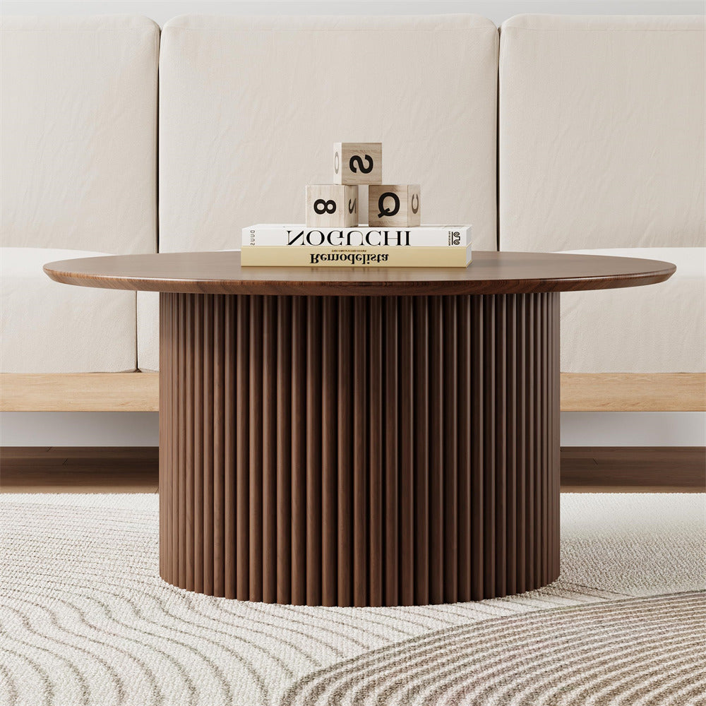 Wooden coffee table with decorative items in a living room setting