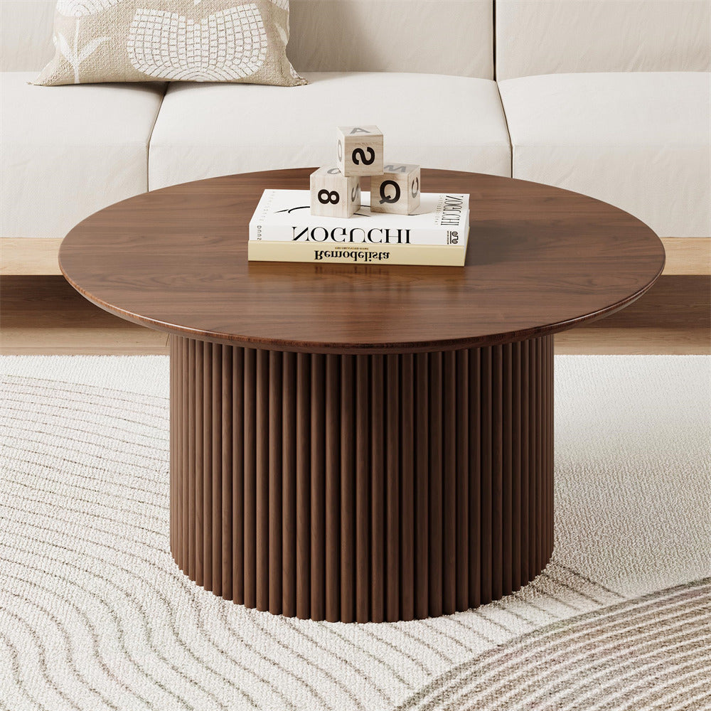 Wooden coffee table with decorative items in a living room setting