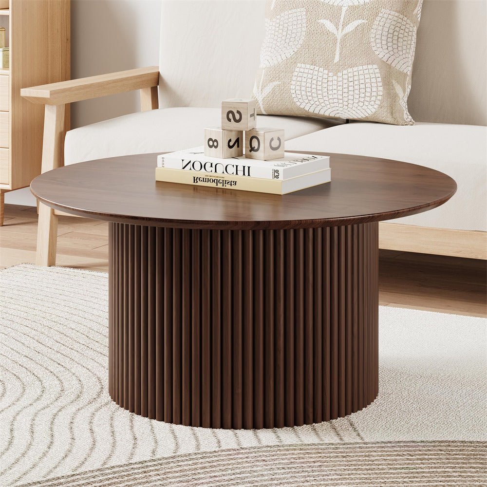 Wooden coffee table with decorative items in a living room setting