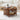 Wooden coffee table with decorative items in a living room setting