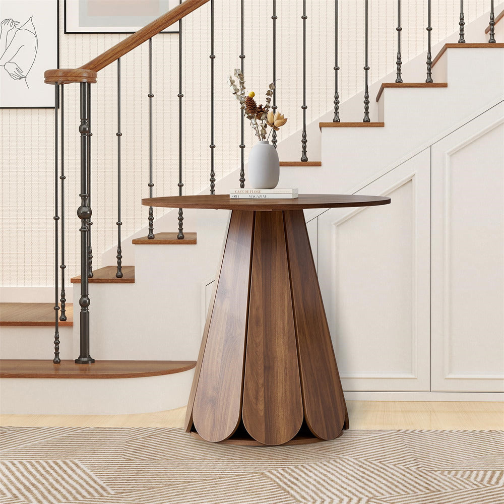 Wooden side table with a vase on it in front of a staircase