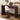 A modern curved wooden console table with a dark brown finish, paired with a white swivel barstool with a black pedestal base. The table is styled in a bright living room setting with a laptop, flowers, and a coffee cup on top.