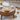 Round wooden coffee table with a laptop, cup, and bread on top, featuring product details and icons.