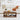 Wooden coffee table with decorative items in a living room setting