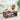 Wooden coffee table with decorative items in a living room setting