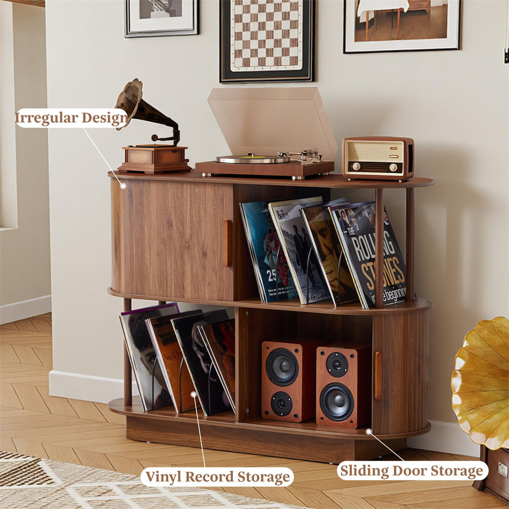 Wooden record player console with vinyl records and speakers in a room.