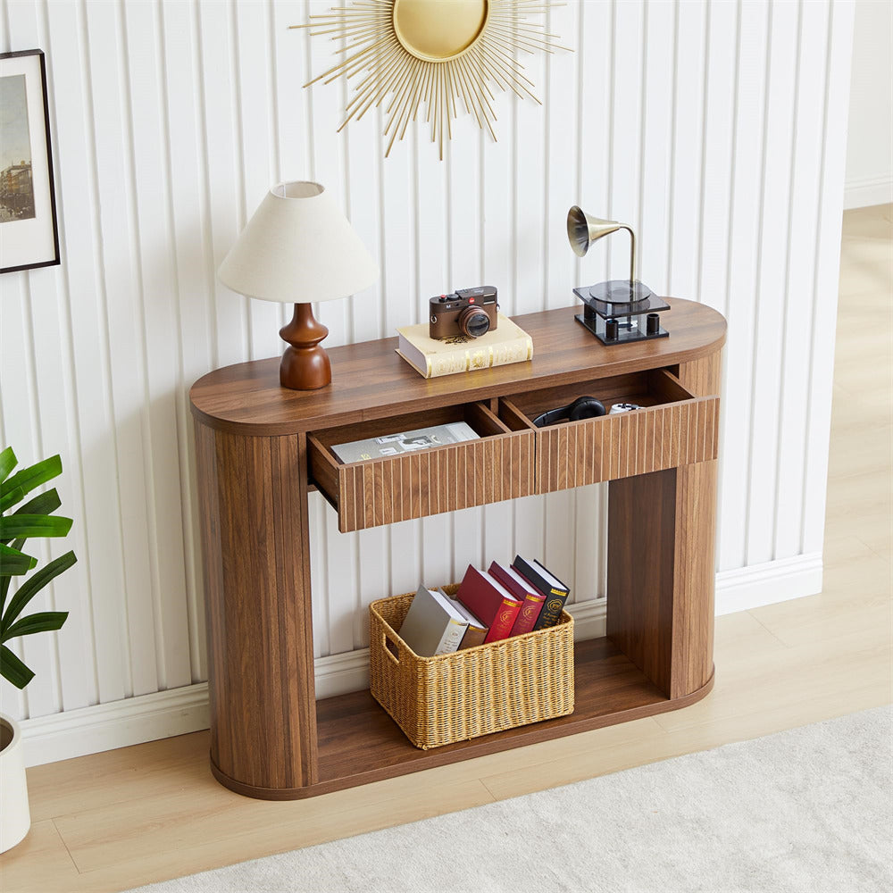 Wooden console table with decorative items in a room setting