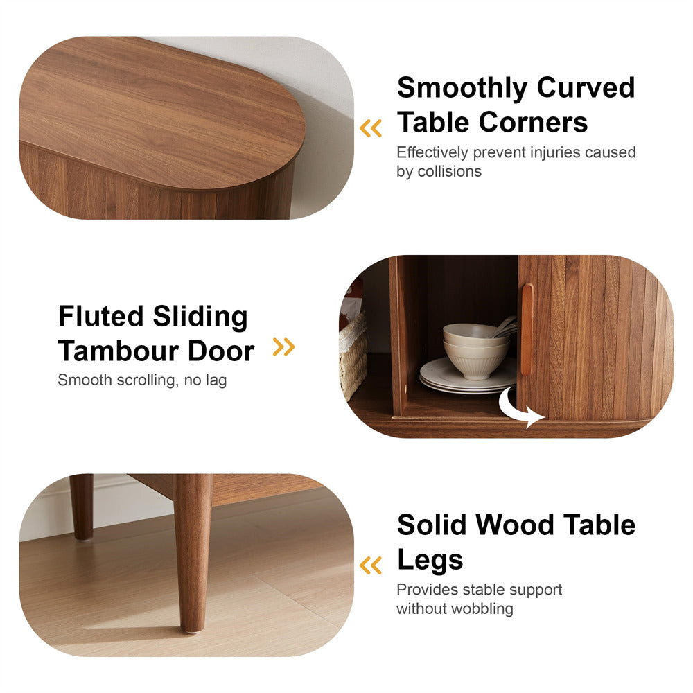 Wooden table with smoothly curved corners, fluted sliding tambour door, and solid wood legs on a white background.