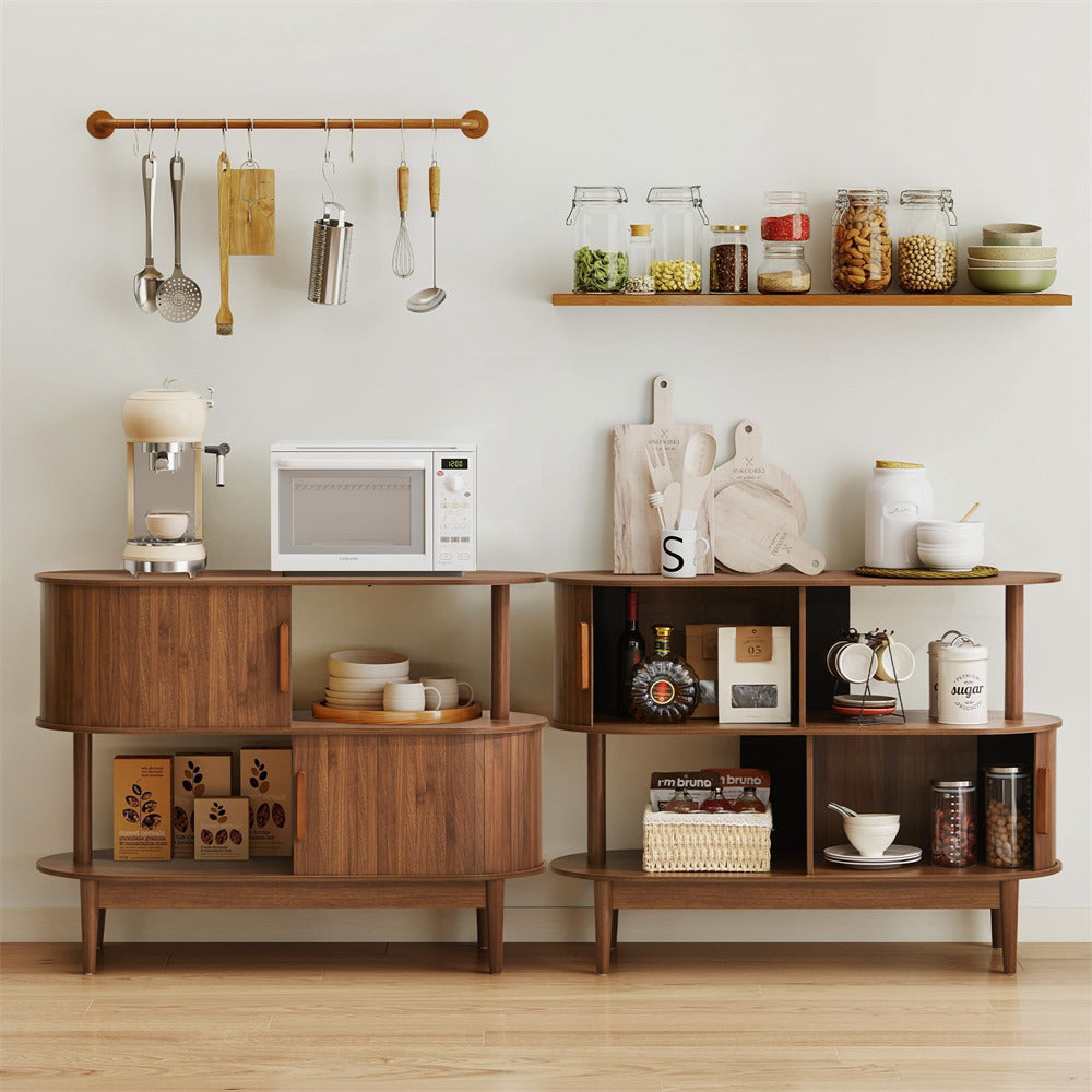 Wooden kitchen shelf with various items including a microwave, jars, and utensils.