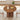 A round wooden dining table with a fluted pedestal base, styled in a bright dining room with two cream chairs, a fruit bowl, and a small vase.