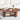 Wooden coffee table with decorative items in a living room setting