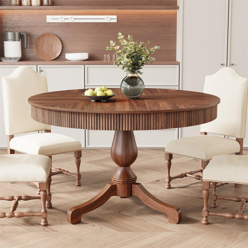Wooden dining table with chairs in a room setting
