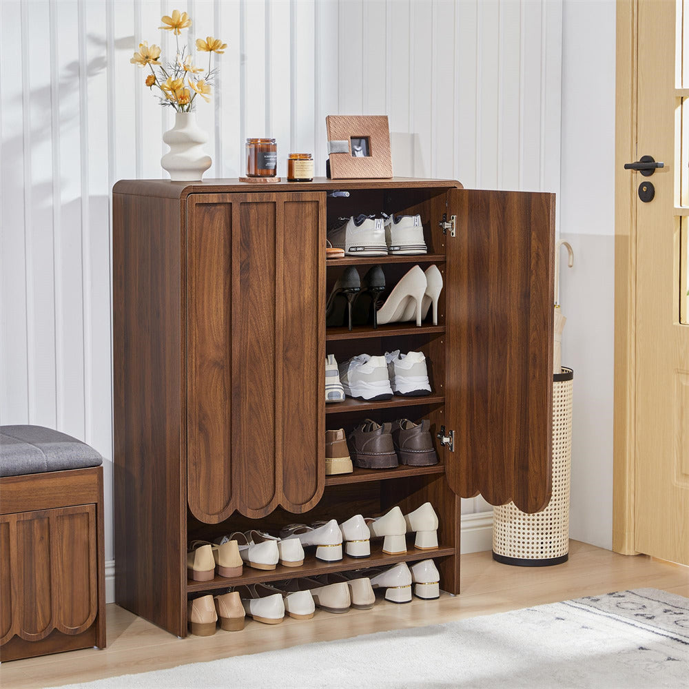 Walnut wooden 5-tier shoe cabinet with open doors displaying shoes in a room setting.