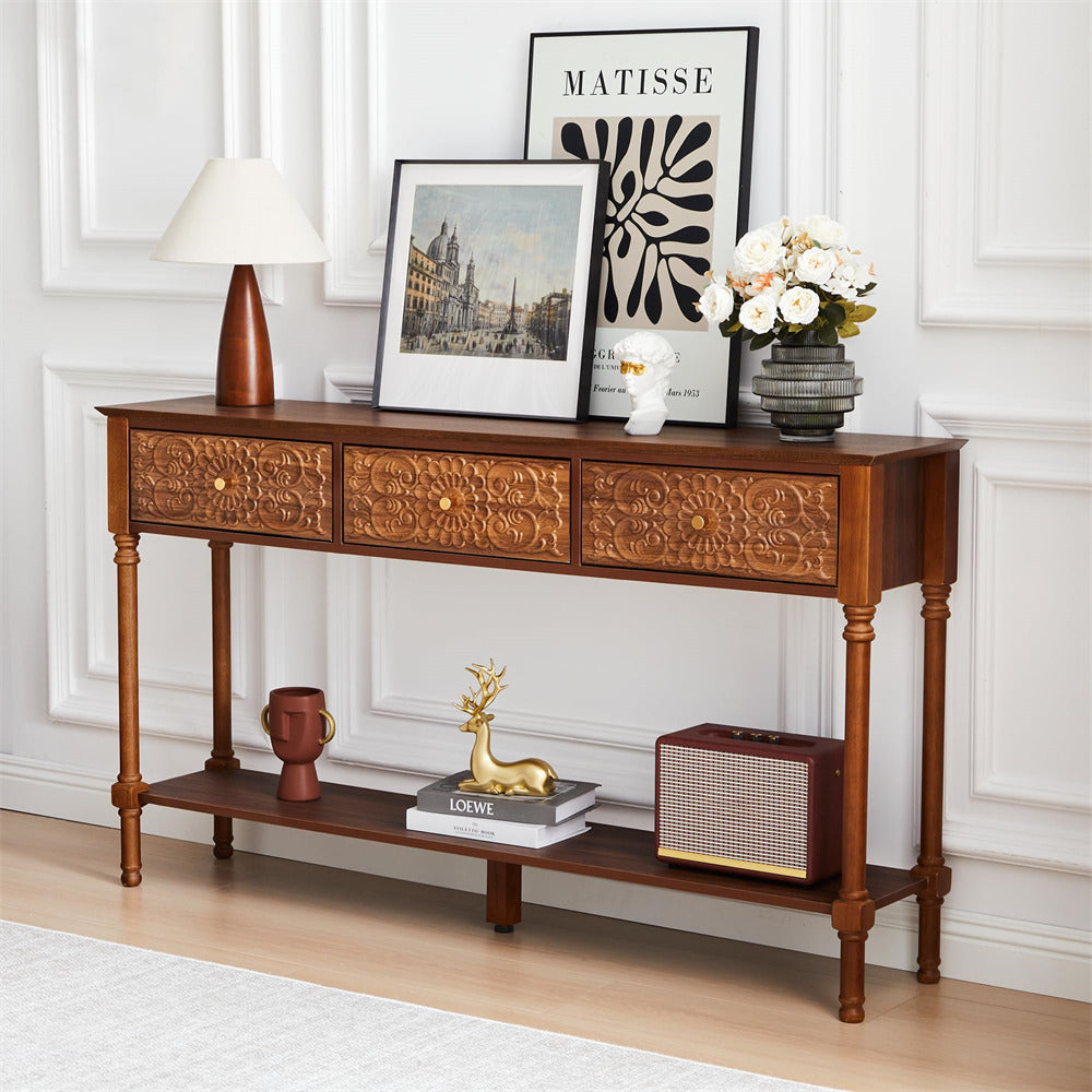 Wooden console table with decorative items against a white wall