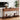 Wooden console table with decorative elements in a living room setting