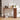 Wooden console table with decorative items in a room setting