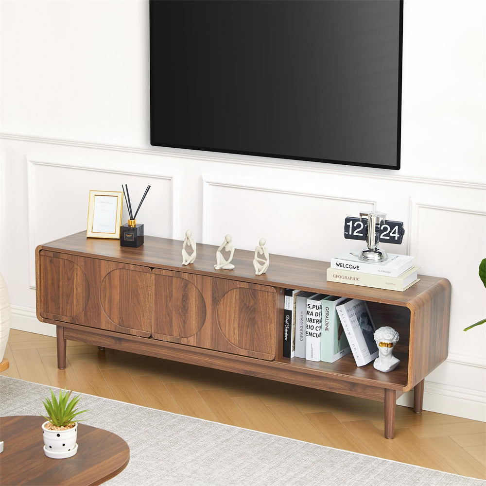 Wooden 59" TV stand with decorative items in a living room setting