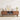 Wooden entertainment console with decorative items in a living room setting